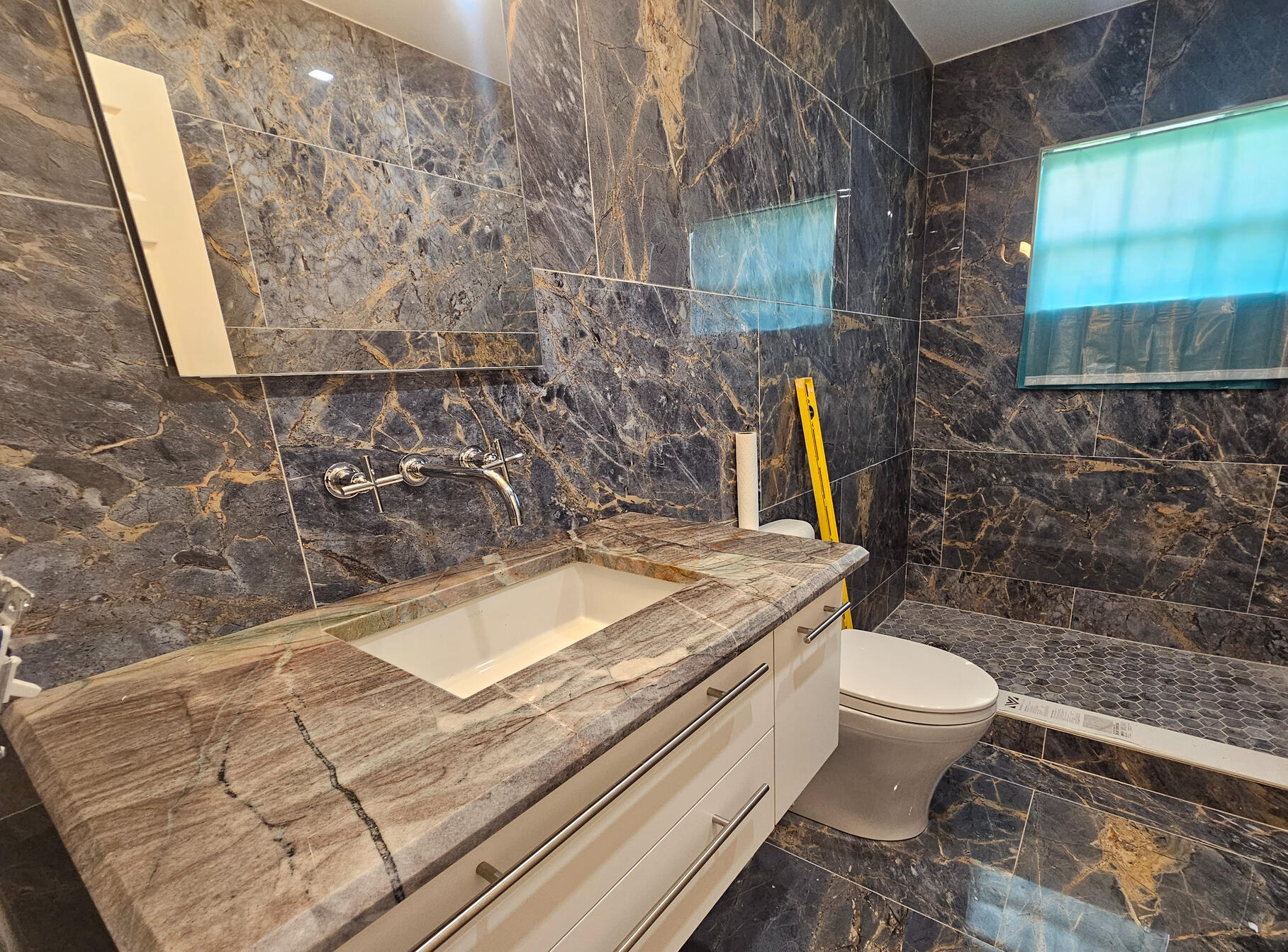 Bathroom remodel with tile shower and vanity installation by Peakline Contracting