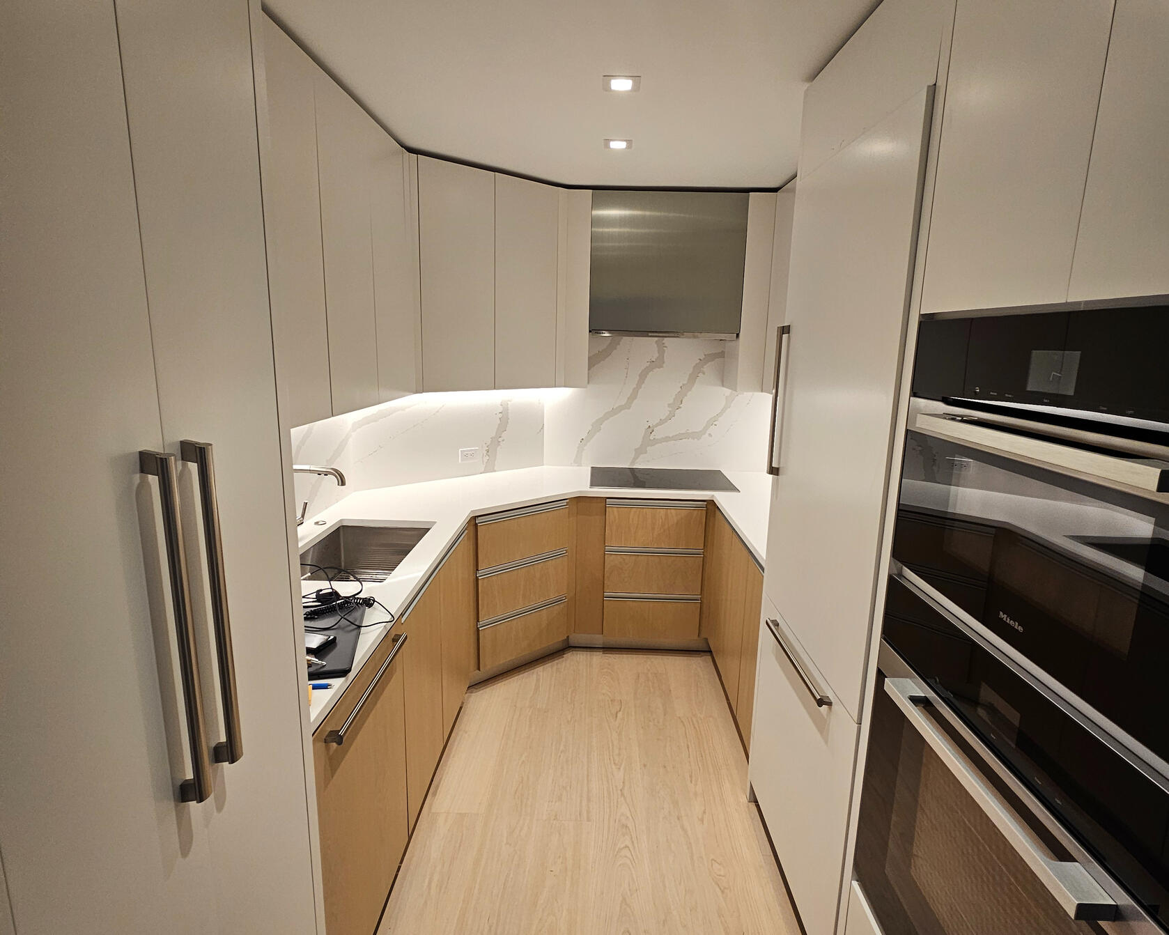 Modern kitchen renovation completed by Peakline Contracting